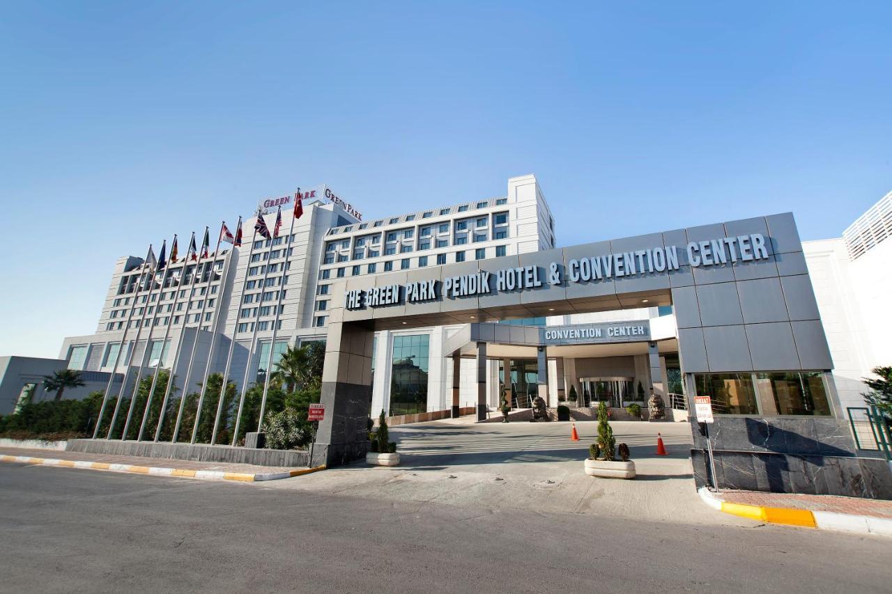 The Green Park Pendik Hotel Istanbul Exterior photo The photo shows the exterior of a modern hotel and convention center. The building has a sleek design and features multiple stories. In the foreground, there is a large entrance with the name "Green Park Pendik Hotel & Convention Center" prominently 